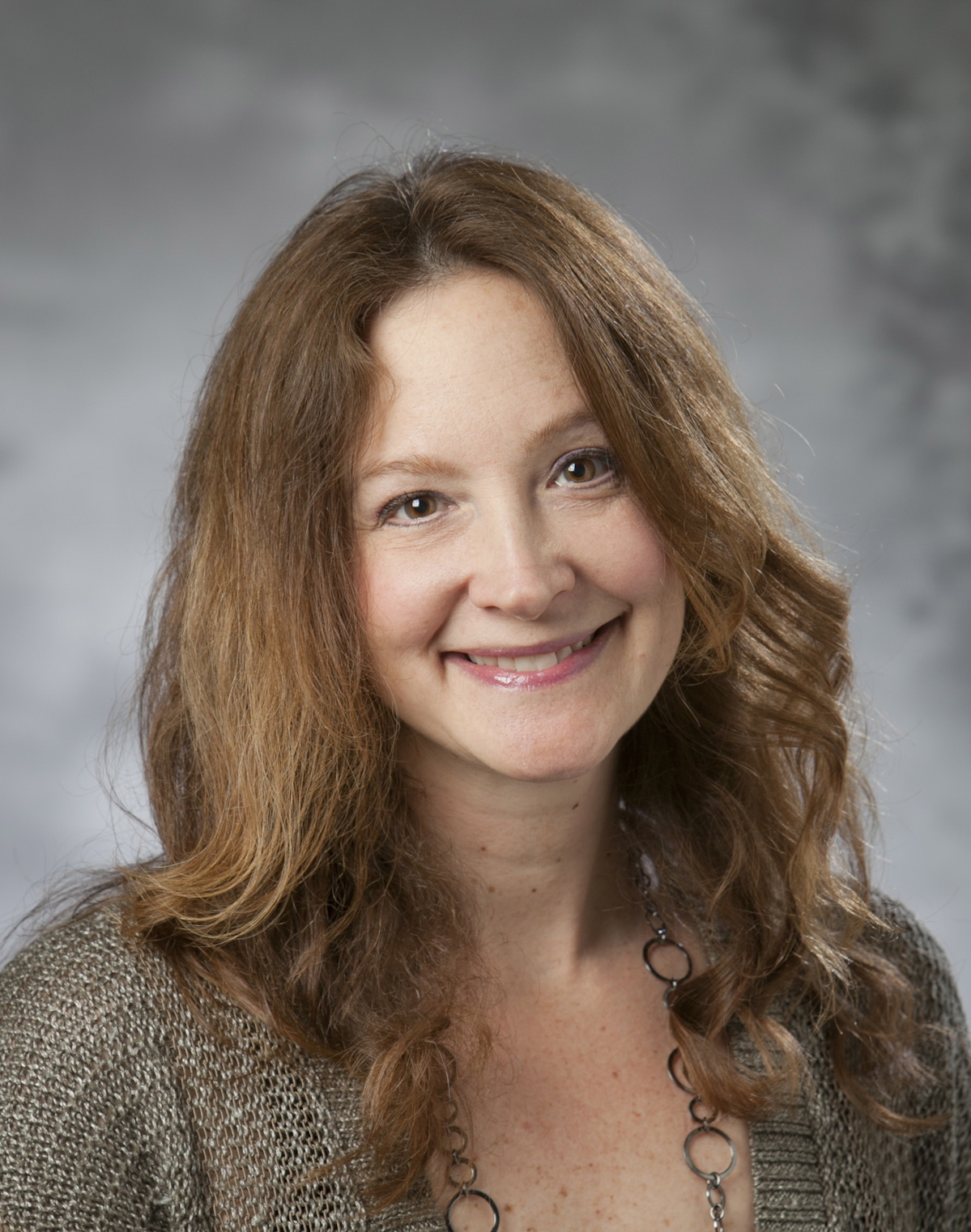 Dr. Denise Comer